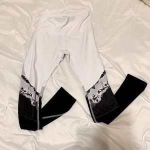 White leggings with marbled, black,mesh detail